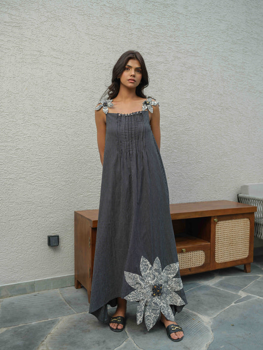 VETRA – A BLACK  dress with pleated neckline, flower detailing on the straps