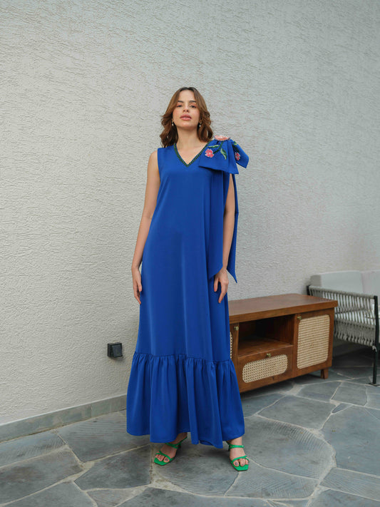 CARLA – An electric blue dress featuring bow detailing on the shoulder