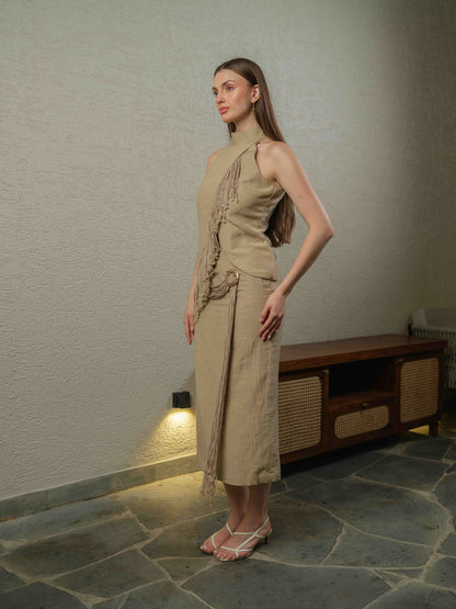 SWING – A co-ord set with a turtleneck top featuring fringe detailing, paired with a pencil-fit skirt