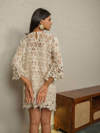 SHELLUNA – A crochet dress adorned with intricate embroidery featuring Kodi shell detailing