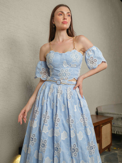 FLORESSA –corset with chain detailing, paired with a pleated skirt and detachable sleeves