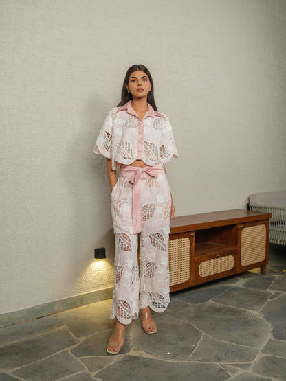 CELOURA – A trendy co-ord set featuring a crop shirt paired with flare pants.