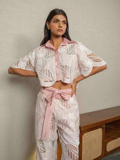 CELOURA – A trendy co-ord set featuring a crop shirt paired with flare pants.
