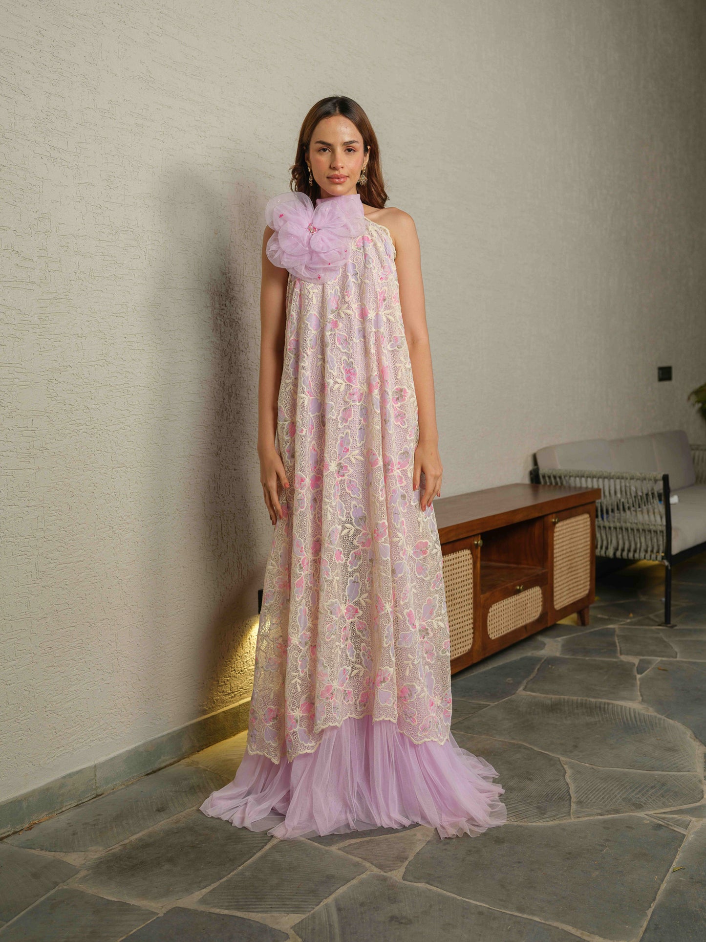 KRISTEN– a long georgette dress featuring a net bow at the back and 3D floral embellishments on the bodice.