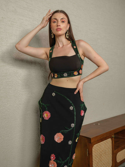 OBSCURA – Tube top with embroidery paired with a structured skirt featuring 3D embroidered detailing.