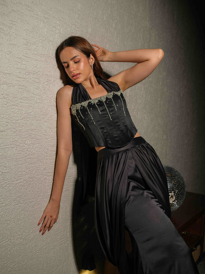 STARRY – A corset necktie top with stone detailing, paired with a pre-draped skirt