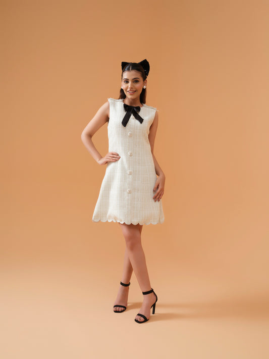 Muse dress with bow and shoulder detailing