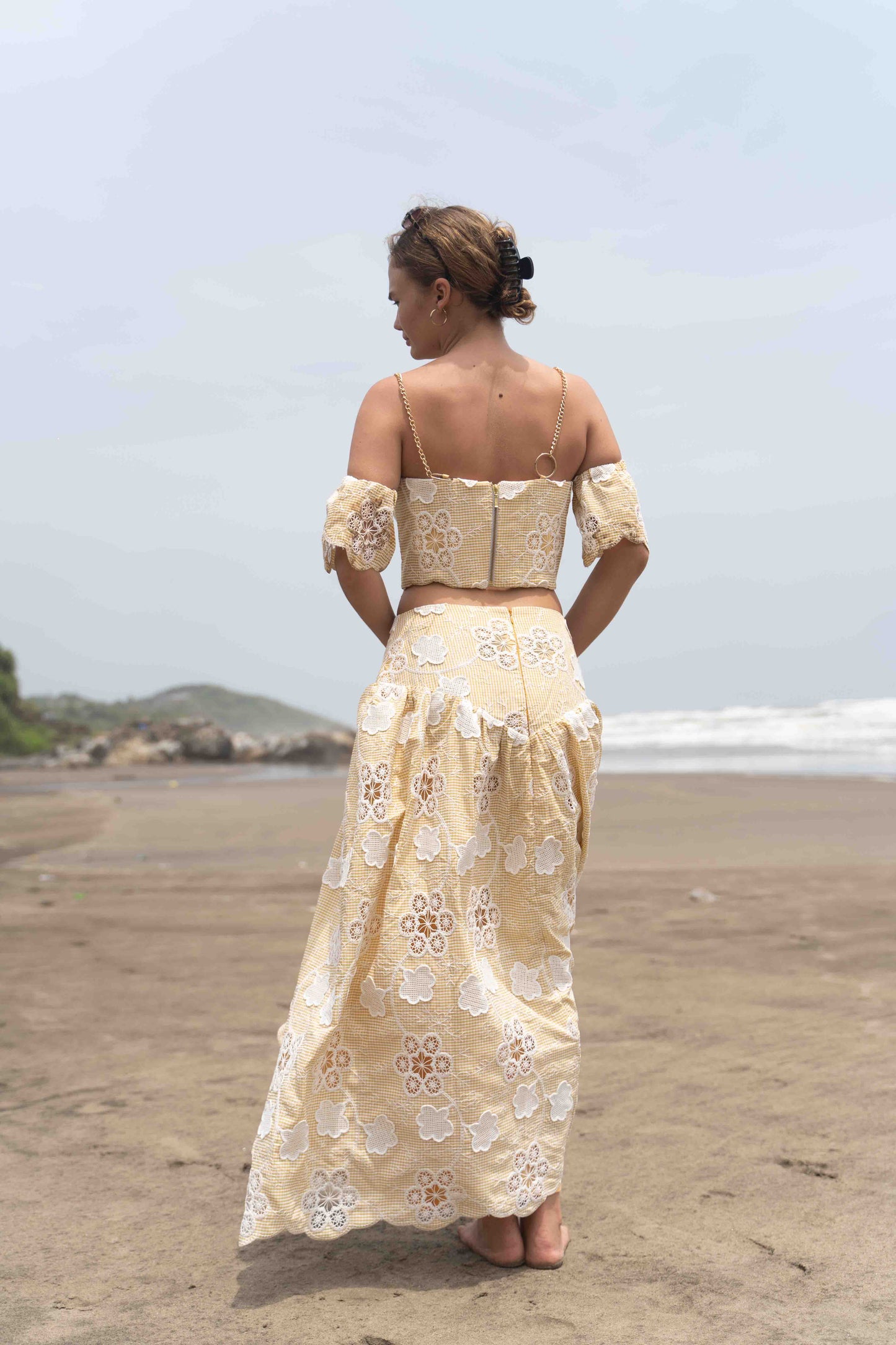 STARLIT –corset with chain detailing, paired with drop waist skirt and detachable sleeves.