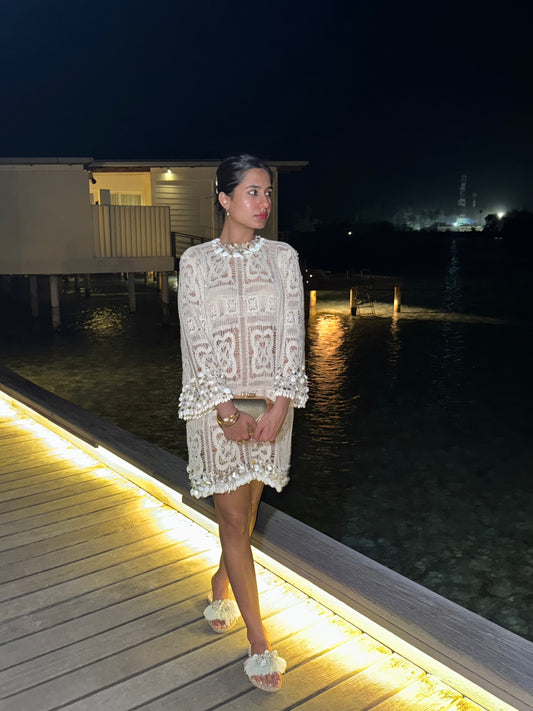 CASPIAN – A crochet dress adorned with intricate embroidery featuring Kodi shell detailing