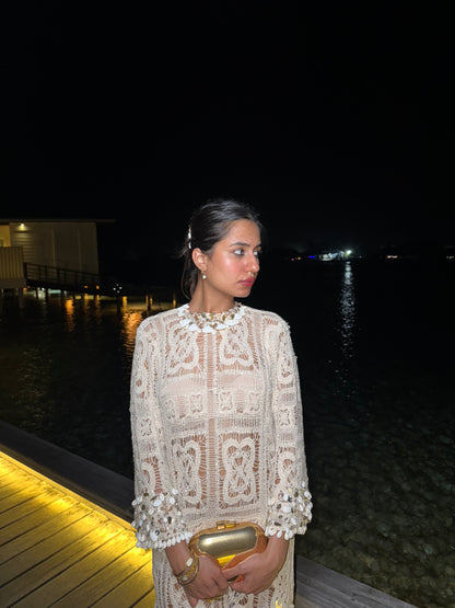 CASPIAN – A crochet dress adorned with intricate embroidery featuring Kodi shell detailing