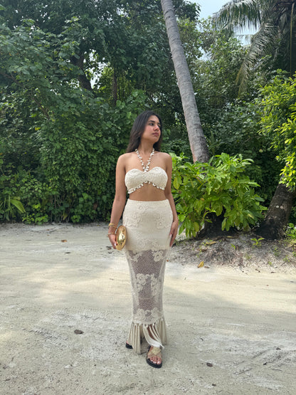 COVE– Crochet co-ord with a Kodi-detailed tube top paired with a pencil-fit skirt
