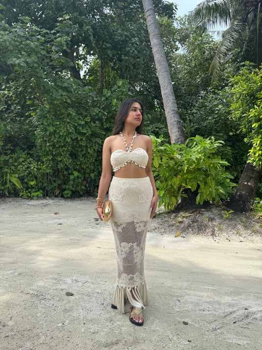 COVE– Crochet co-ord with a Kodi-detailed tube top paired with a pencil-fit skirt