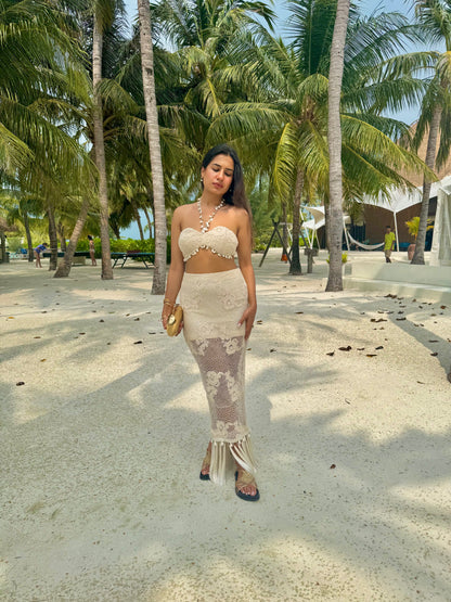 COVE– Crochet co-ord with a Kodi-detailed tube top paired with a pencil-fit skirt