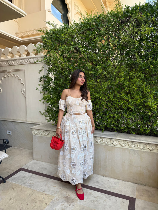 STARLIT –corset with chain detailing, paired with drop waist skirt and detachable sleeves.