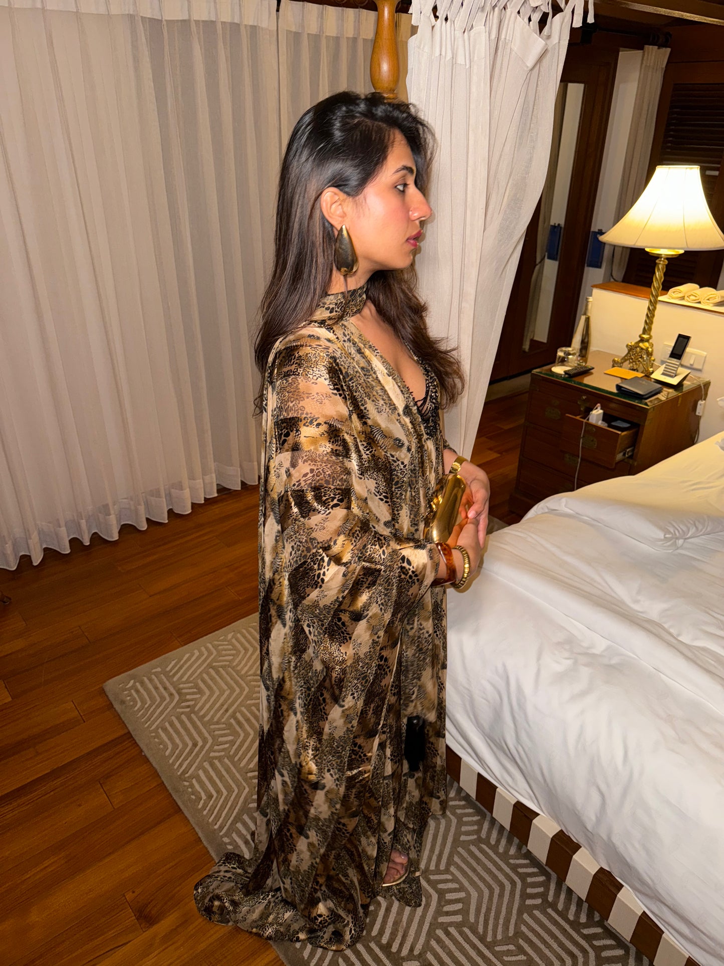 ROAM - A Cheetah print long flowy kaaftan with v neck bead detailing