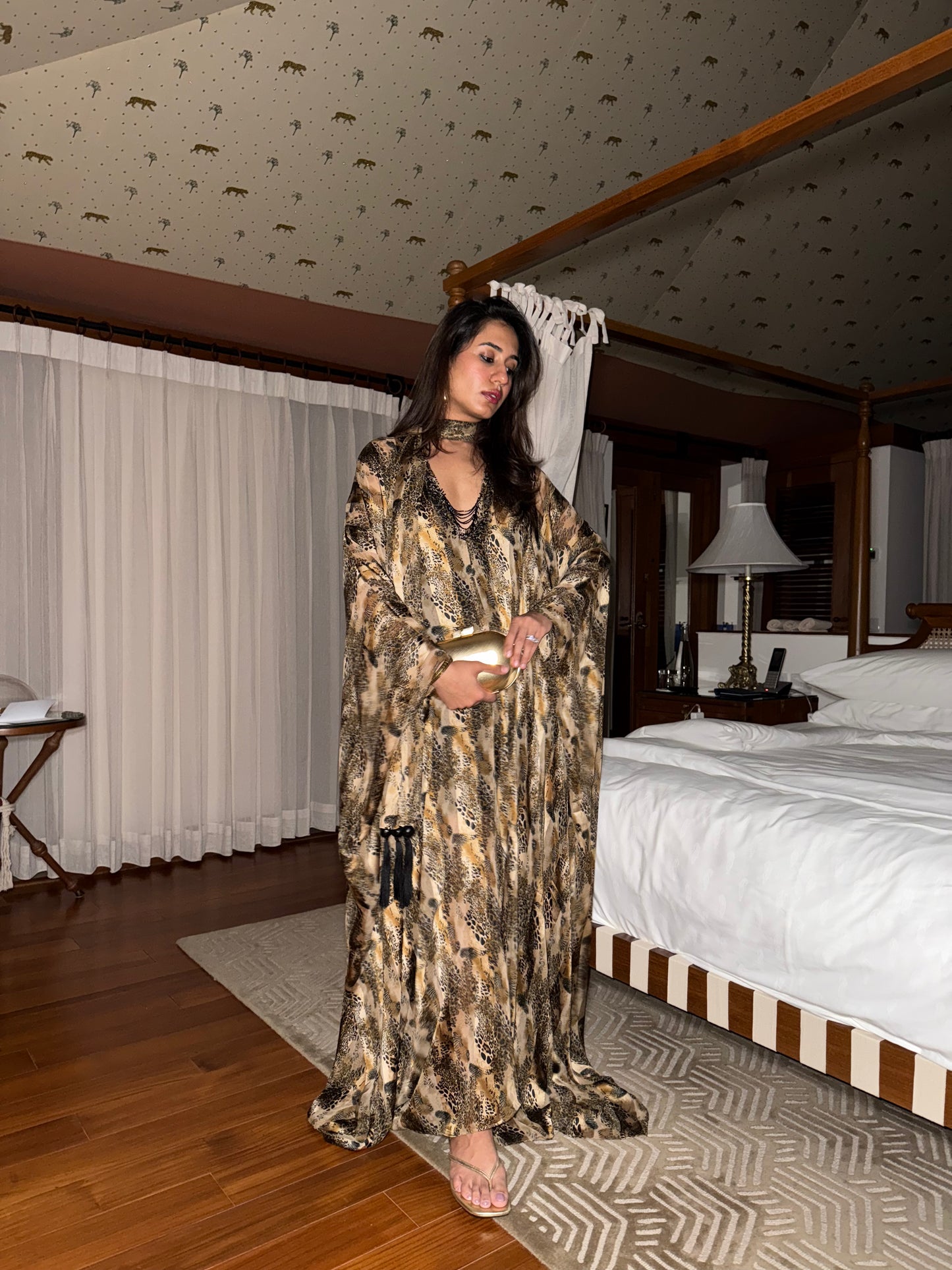 ROAM - A Cheetah print long flowy kaaftan with v neck bead detailing