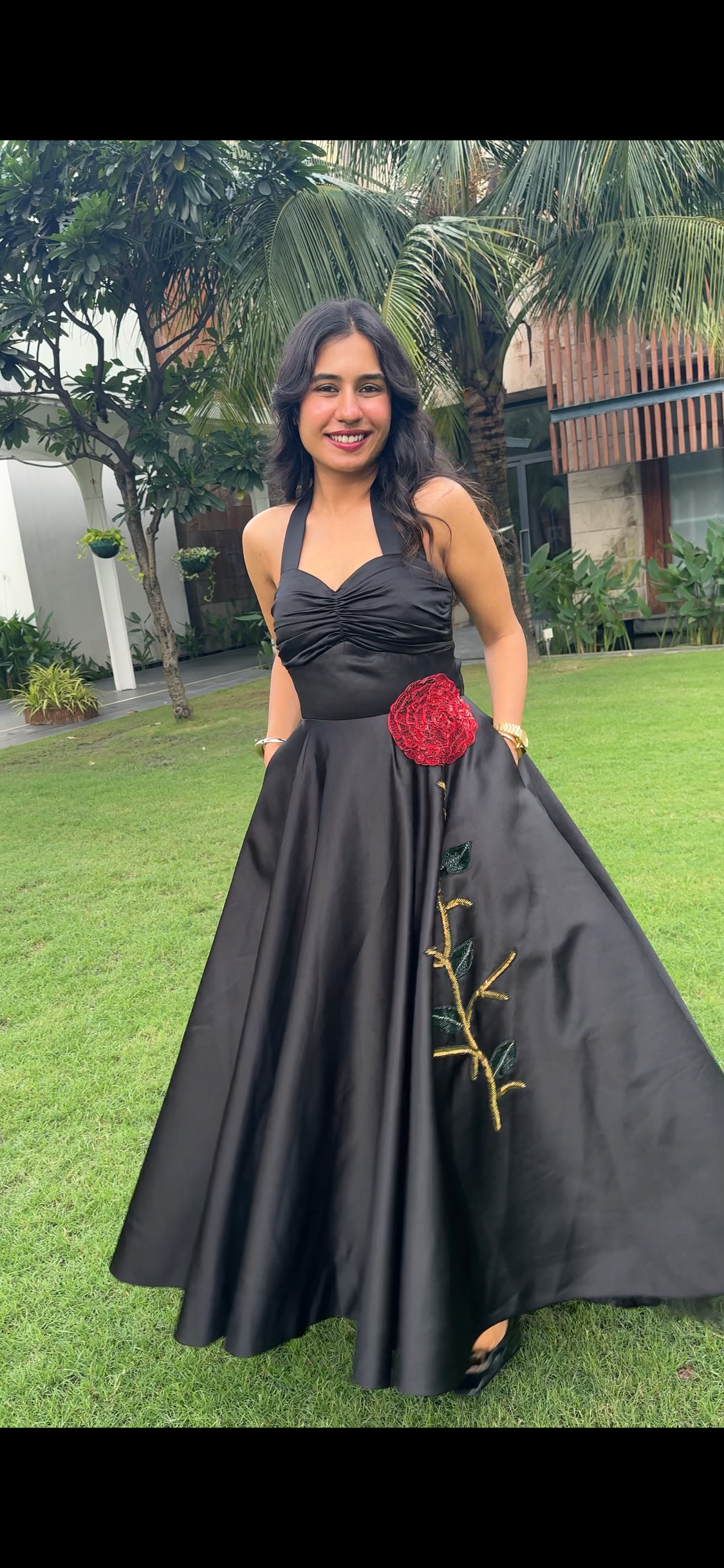 Rose – Halter neck tea length dress adorned with beautiful floral embroidery.