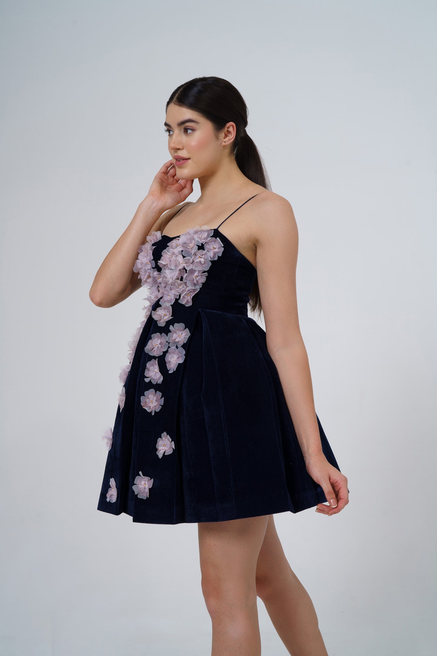 Fizza abdi in Fiona short dress with 3d flowers